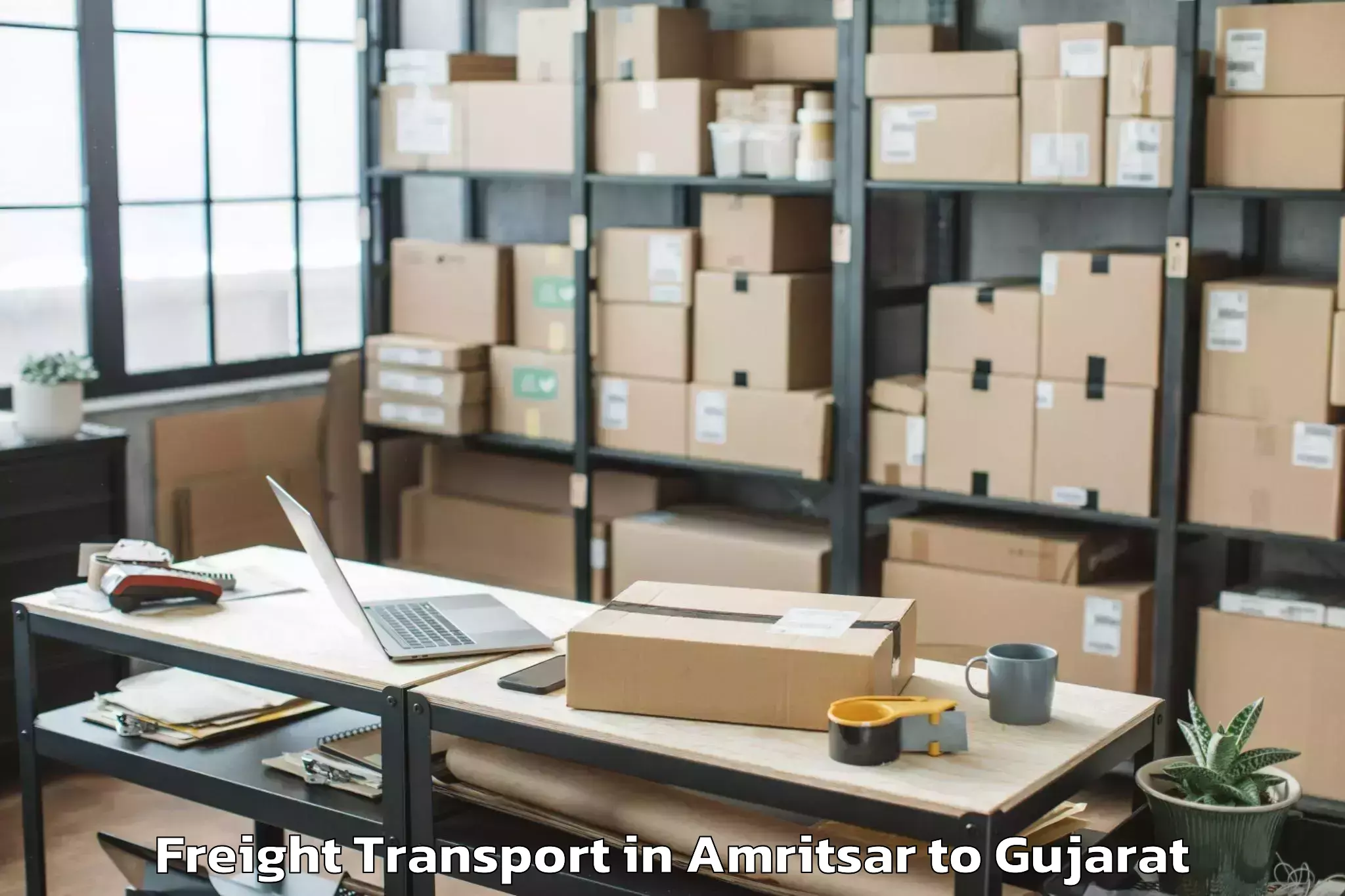 Top Amritsar to Khambhalia Freight Transport Available